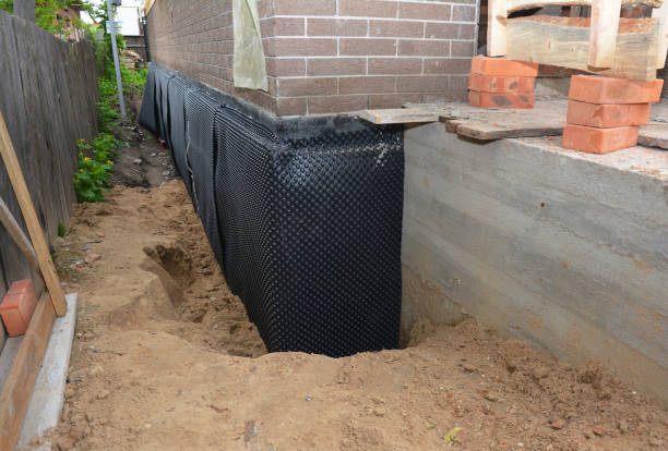 Happy homeowners after waterproofing job in Vineland